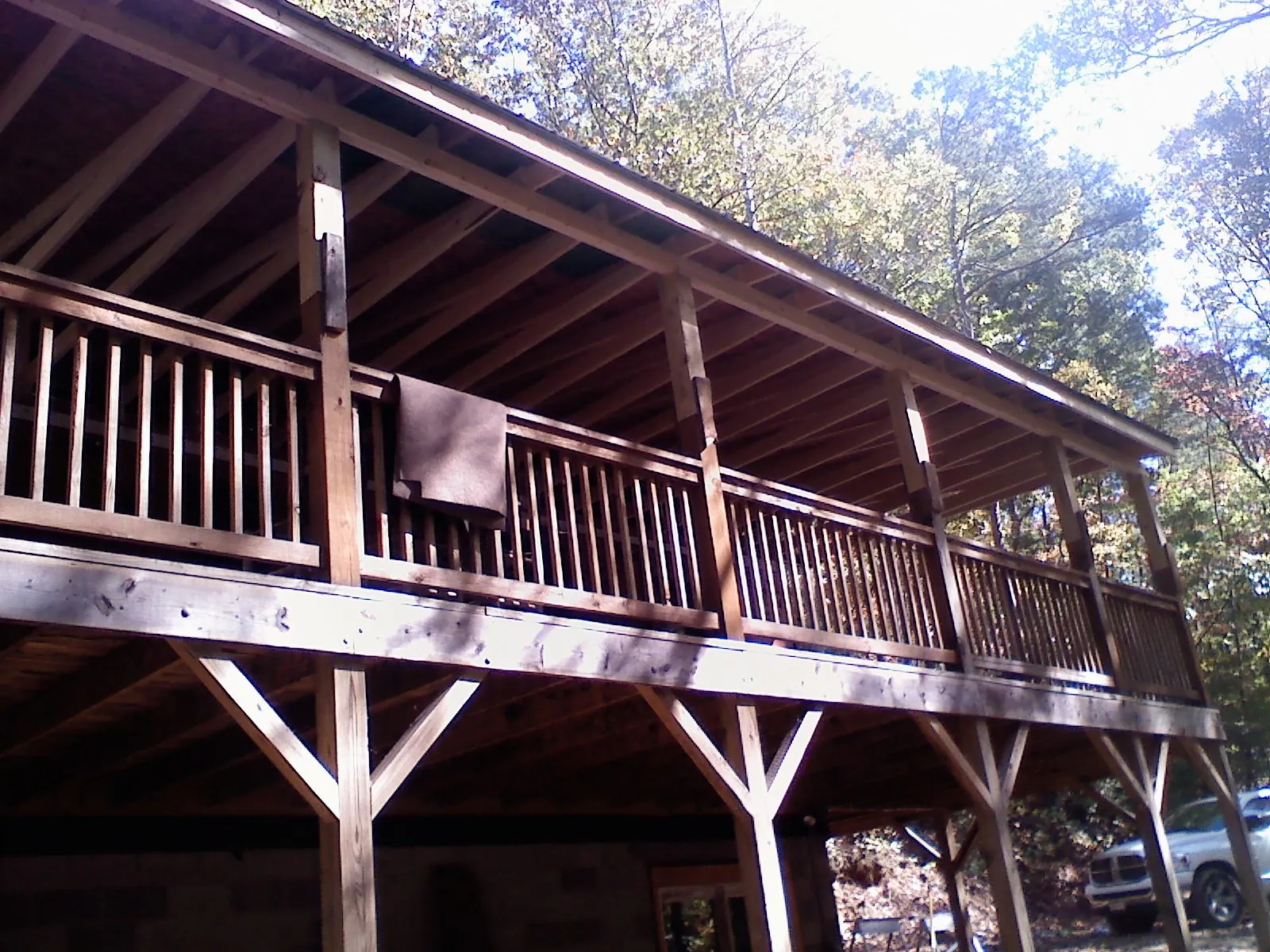 Timber framing under a new elevated porch and deck — Roof Leak Repair in Keokuk by Roofing Brothers